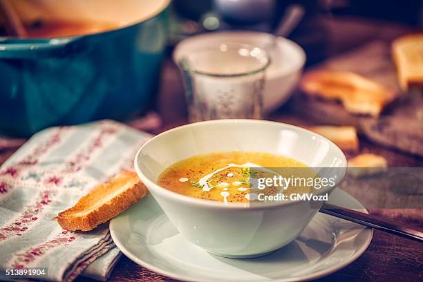 delicous chicken soup with carrots and parsnips - pepper pot stock pictures, royalty-free photos & images