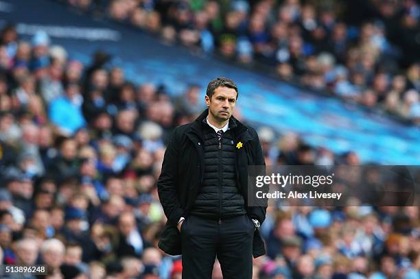 Remi Garde Manager of Aston Villa looks on during the Barclays Premier League match between Manchester City and Aston Villa at Etihad Stadium on...