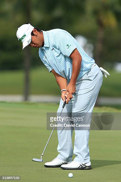 Hideki Matsuyama of Japan reacts to his putt on the fifth hole during the third round of the World Golf Championships-Cadillac Championship at Trump...