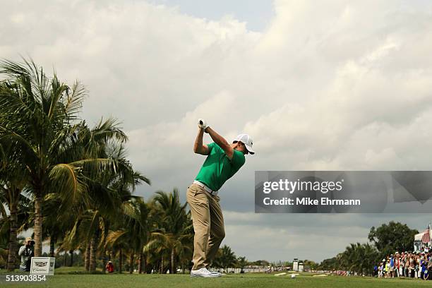 Rory McIlroy of Northern Ireland tees off on the second hole during the third round of the World Golf Championships-Cadillac Championship at Trump...