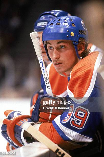 Wayne Gretzky of the Edmonton Oilers watches the action from the bench during a game in 1984. Wayne Gretzky played for the Edmonton Oilers from 1979