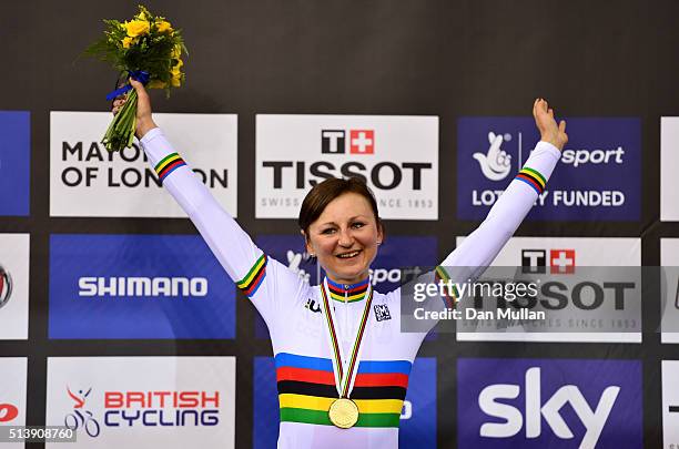 Katarzyna Pawlowska of Poland celebrates on the podium after winning the gold medal in the Women's Points Race during Day Four of the UCI Track...