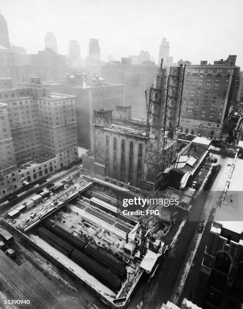 The foundation for the new Waldorf-Astoria Hotel is laid between the railroad tracks at the site of the New York Central Power House, New York, New...