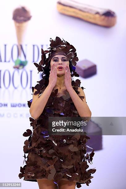 Model wearing dress made of chocolate walks the runway during the 5th Salon du Chocolat at the Expocentre Exhibition Complex in Moscow, Russia, on...