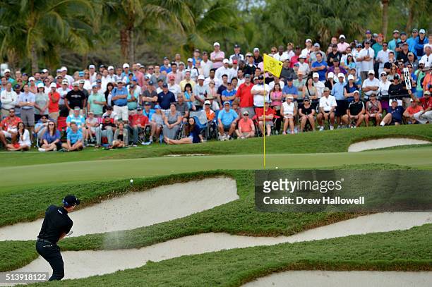 Danny Willett of England out of the bunker on the 16th hole during the third round of the World Golf Championships-Cadillac Championship at Trump...