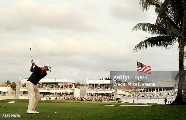 Adam Scott of Australia takes his shot on the 18th hole during the third round of the World Golf Championships-Cadillac Championship at Trump...