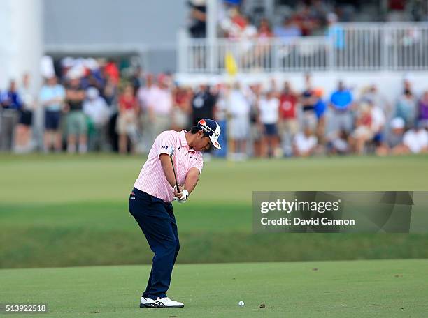 Hideki Matsuyama of Japan plays a short iron during the second round of the 2016 World Golf Championship Cadillac Championship on the Blue Monster...