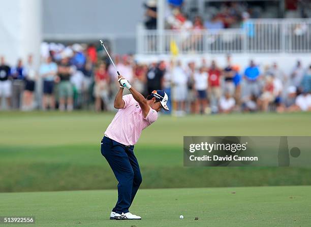 Hideki Matsuyama of Japan plays a short iron during the second round of the 2016 World Golf Championship Cadillac Championship on the Blue Monster...