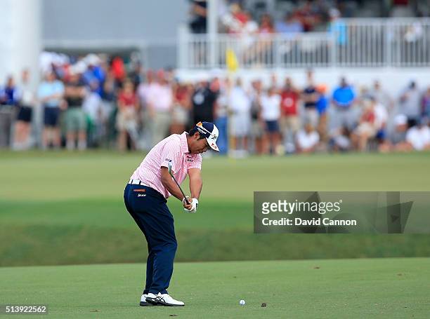 Hideki Matsuyama of Japan plays a short iron during the second round of the 2016 World Golf Championship Cadillac Championship on the Blue Monster...