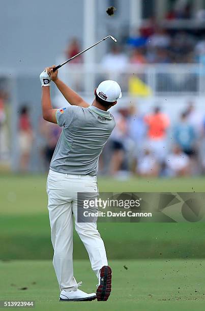 Byeong-Hun An of Sputh Korea plays a short iron during the second round of the 2016 World Golf Championship Cadillac Championship on the Blue Monster...