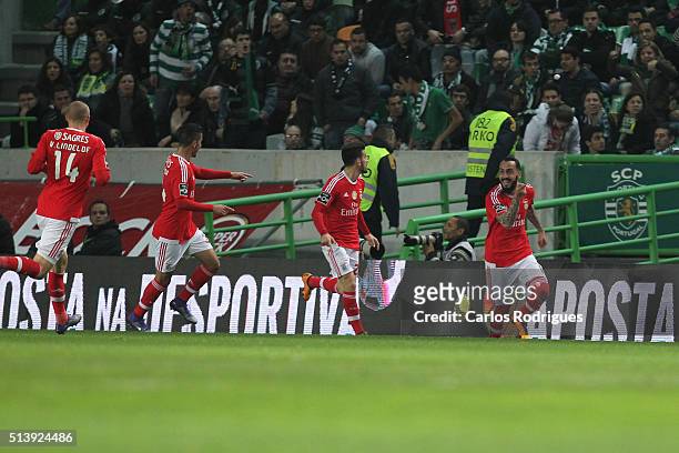 Benfica's forward Kostas Mitroglou celebrates scoring Benfica«s goal with his team mates during the match between Sporting CP and SL Benfica for the...