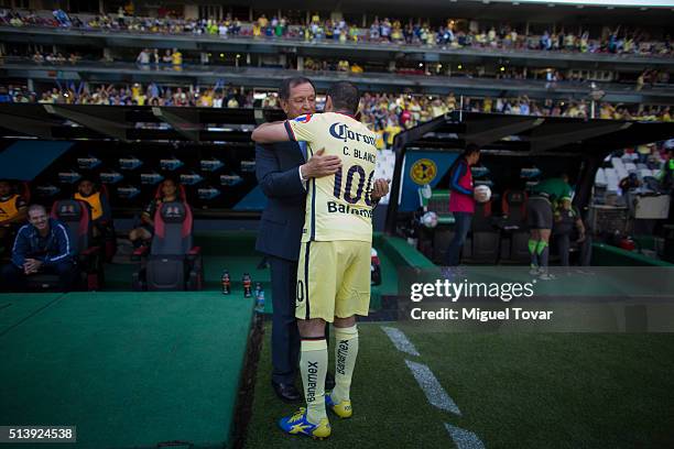 Cuauhtemoc Blanco of America greets Enrique Meza coach of Morelia prior the 9th round match between America and Morelia as part of the Clausura 2016...