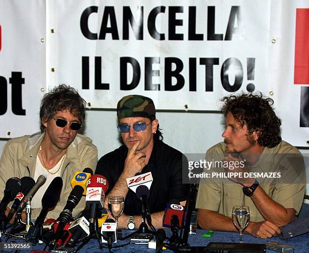 From L-R: Rock stars, Irish Bob Geldof and Bono and Italian Lorenzo Jovanotti attend a press conference asking for writing off the debt of the...