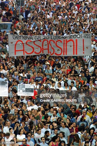 Thousands of anti-globalisation protesters opposed to the government's handling of riots that marred a Group of Eight summit in Genoa last week,...