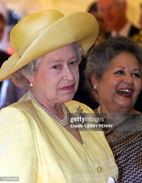 Queen Elizabeth II in pensive mood, with Baroness Flathers , before laying the foundation stone of the Memorial Gates on Constitution Hill, 01 August...