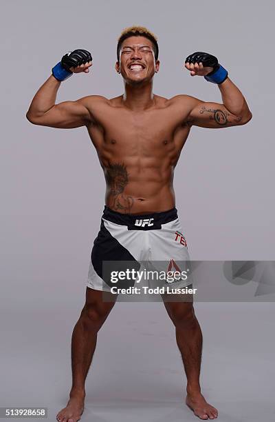 Teruto Ishihara of Japan poses for a post-fight portrait backstage during the UFC 196 event inside MGM Grand Garden Arena on March 5, 2016 in Las...