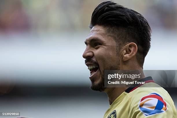 Oribe Peralta of America celebrates after scoring the first goal of his team during the 9th round match between America and Morelia as part of the...