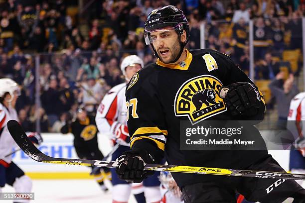 Patrice Bergeron of the Boston Bruins celebrates after scoring against the Washington Capitals during the first period at TD Garden on March 5, 2016...