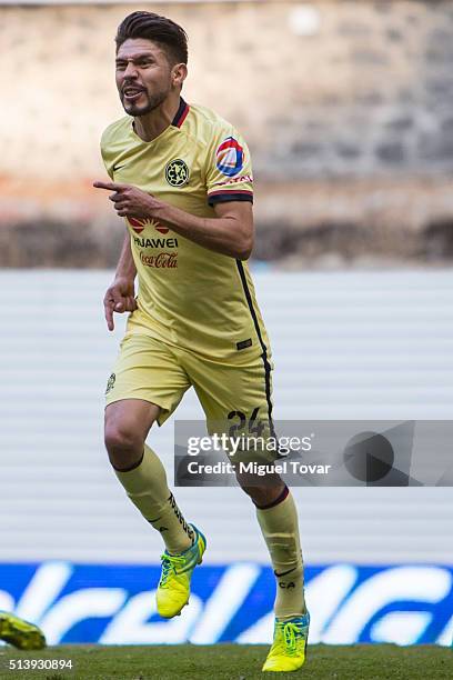 Oribe Peralta of America celebrates after scoring the first goal of his team during the 9th round match between America and Morelia as part of the...