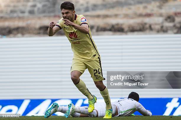 Oribe Peralta of America celebrates after scoring the first goal of his team during the 9th round match between America and Morelia as part of the...