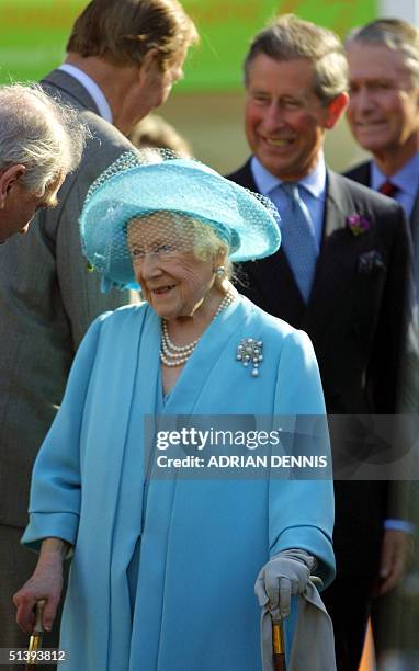 Britain's Queen Mother arrives with her grandson Prince Charles at The Chelsea Flower Show in London 21 May 2001. Prince Charles was exhibiting his...