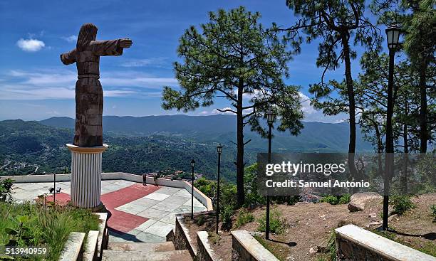 Christ Monument and panoramic view of the Silver Town of Taxco, Mexico.