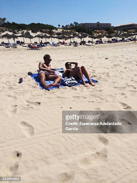 People on the beach in Cadiz, Spain August 25, 2014