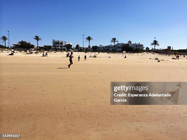 People on the beach in Cadiz, Spain August 25, 2014