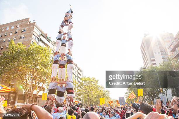 Catalan people celebrates the Catalonia national day on 9/11 with a rally in the streets of Barcelona with the streets of Gran Via and the Diagonal...