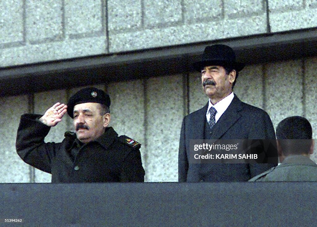 Sadam R 2 Iraqi President Saddam Hussein and Vice President Taha Yassin Ramadan ...