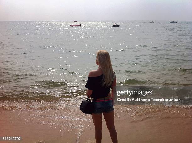 Woman on the Beach. Jomtien Beach, Pattaya Chonburi, Thailand. December 30, 2013