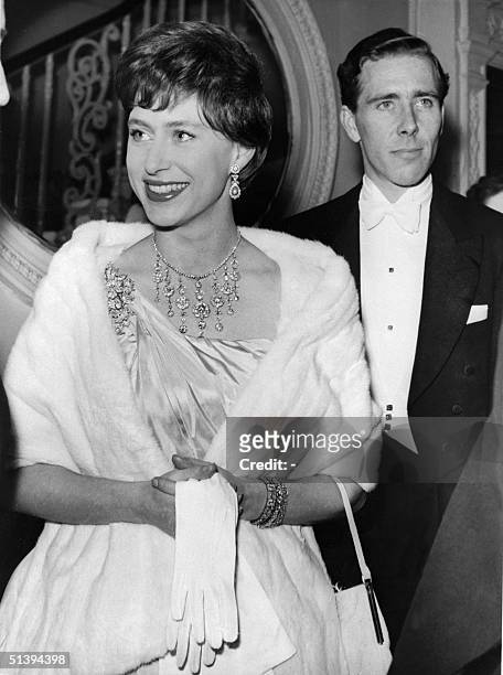 Princess Margaret, the younger sister of future Britain's Queen Elizabeth II, and her husband the photographer Antony Armstrong-Jones arrive in 1960...