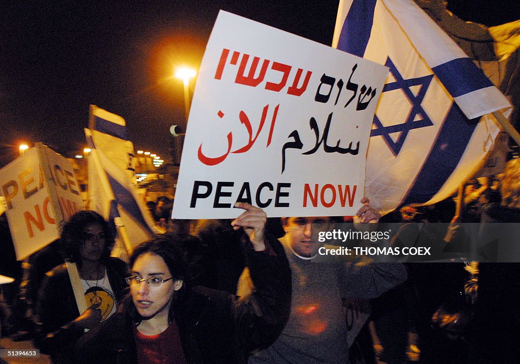 Israeli Peace Now movement members demonstrate in