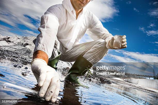 scientist analyze the water of a river - water beaker stock pictures, royalty-free photos & images