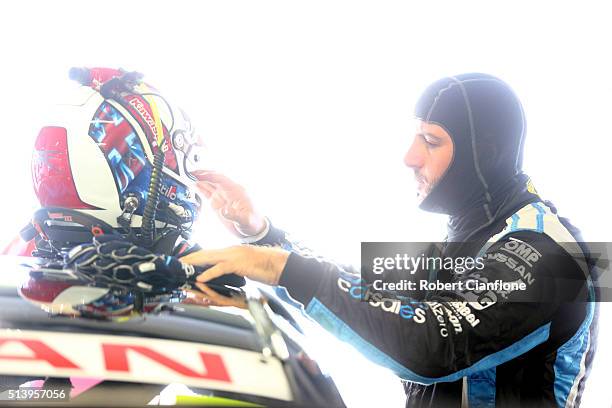 Todd Kelly driver of the Nissan Motorsport Nissan prepares for qualifying for race three for the V8 Supercars Clipsal 500 at Adelaide Street Circuit...