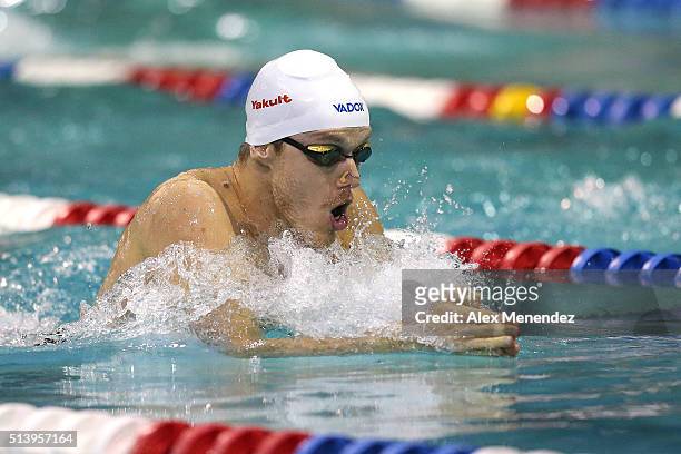 Henrique Rodrigues swims in the men's 200 meter individual medley championship final during day three of the Arena Pro Swim Series at the YMCA of...