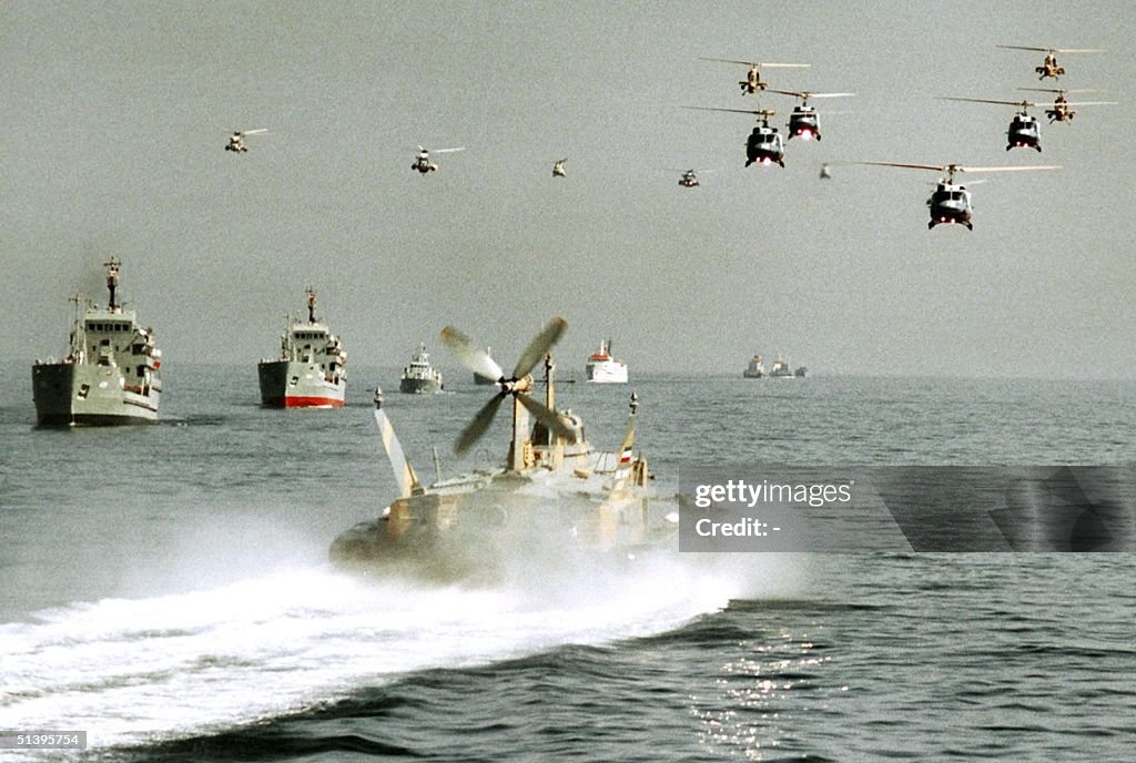 Iranian army helicopters and Navy boats take part