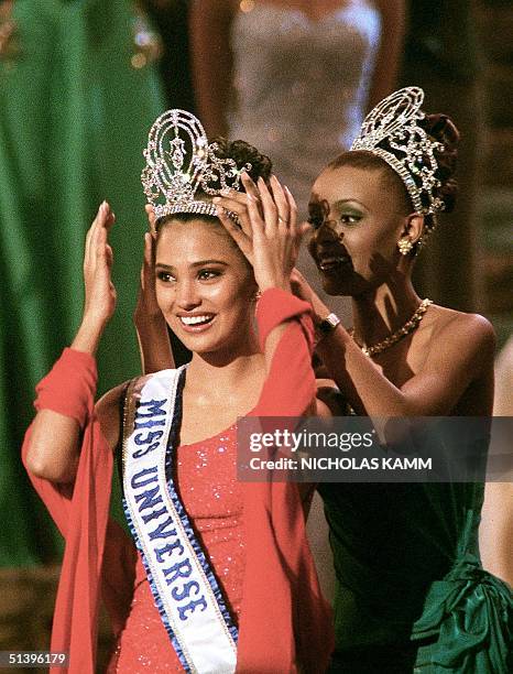 Miss India is crowned Miss Universe 2000 by outgoing title-holder Mpule Kwelagobe of Botswana in Nicosia 13 May 2000. Miss India won ahead of Miss...