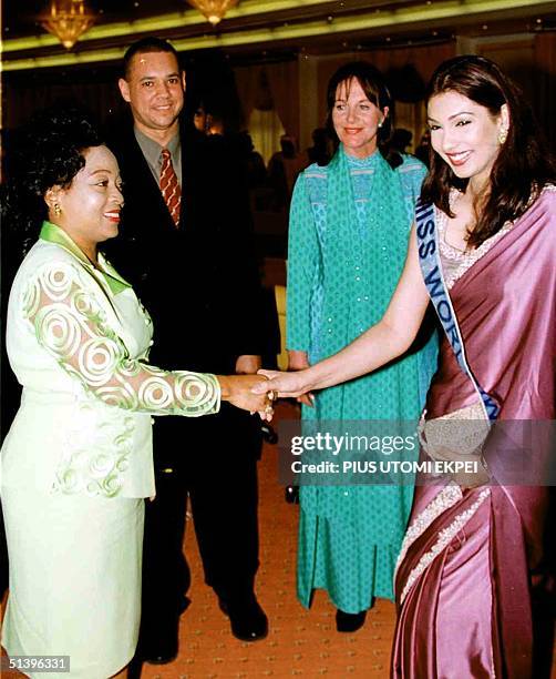 Nigerian first Lady Stella Obasanjo receives Indian beauty queen and Miss World Yukta MooKhey at Abuja presidential villa 30 May, 2000. Miss Mookhey...