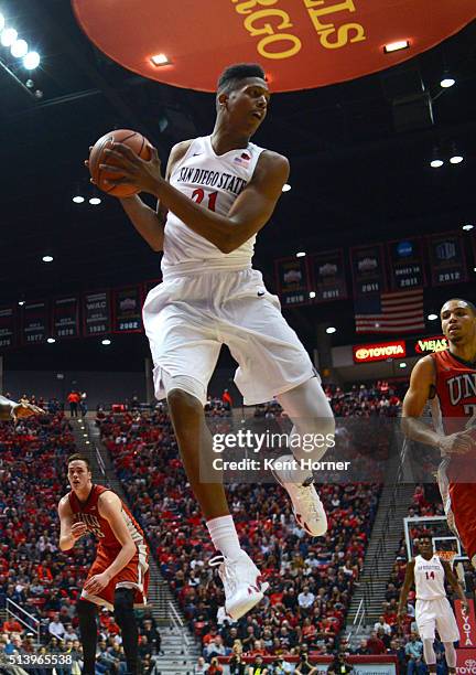 Malik Pope of the San Diego State Aztecs grabs the ball off a rebound in the first half against the UNLV Runnin' Rebels at Viejas Arena on March 5,...