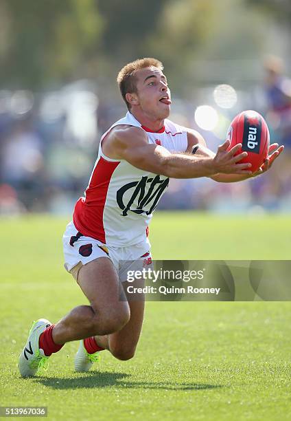 Ben Kennedy of the Demons marks during the 2016 AFL NAB Challenge match between the Western Bulldogs and the Melbourne Demons at Highgate Reserve on...