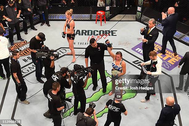 An overhead view of the Octagon as Miesha Tate reacts to her victory over Holly Holm in their UFC women's bantamweight championship bout during the...
