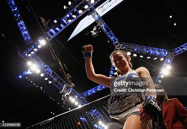 Miesha Tate exits the Octagon after defeating Holly Holm in their UFC women's bantamweight championship bout during the UFC 196 event inside MGM...