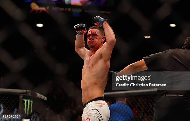 Nate Diaz reacts to his victory over Conor McGregor of Ireland in their welterweight bout during the UFC 196 event inside MGM Grand Garden Arena on...