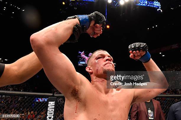 Nate Diaz reacts to his victory over Conor McGregor of Ireland in their welterweight bout during the UFC 196 event inside MGM Grand Garden Arena on...