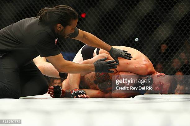 Nate Diaz applies a chokehold to win by submission against Conor McGregor during UFC 196 at the MGM Grand Garden Arena on March 5, 2016 in Las Vegas,...