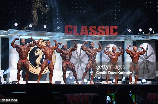 Juan Morel, Josh Lenartowicz, Kai Greene, Cedric McMillan, Branch Warren and Justin Compton compete onstage in the Arnold Classic at the Arnold...