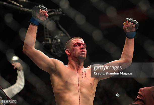 Nate Diaz celebrates his submission victory over Conor McGregor in their welterweight bout during the UFC 196 in the MGM Grand Garden Arena on March...