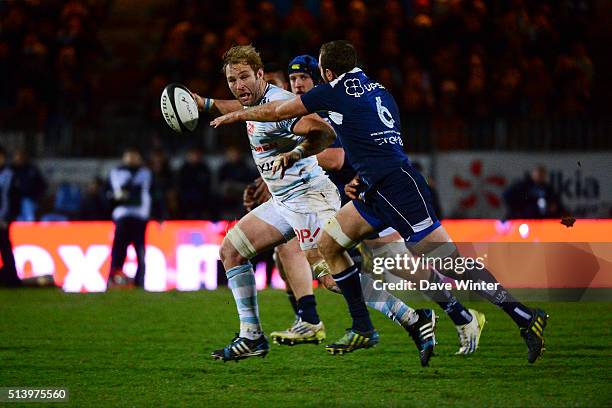 Antoine Claassen of Racing 92 breaks away from Remi Vaquin of Agen during the French Top 14 rugby union match between Racing 92 v Agen at Stade Yves...