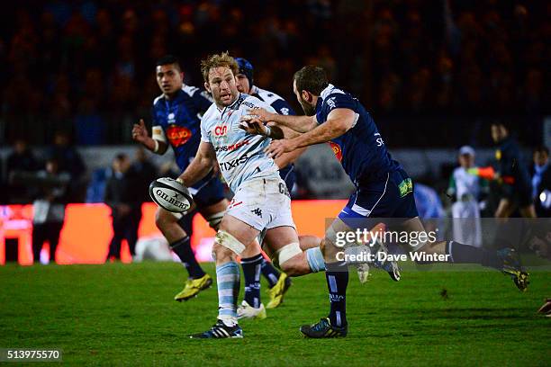 Antoine Claassen of Racing 92 breaks away from Remi Vaquin of Agen during the French Top 14 rugby union match between Racing 92 v Agen at Stade Yves...